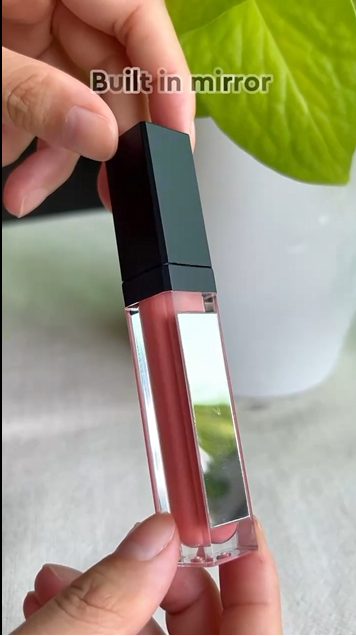 Lip gloss tube showing the built-in side mirror